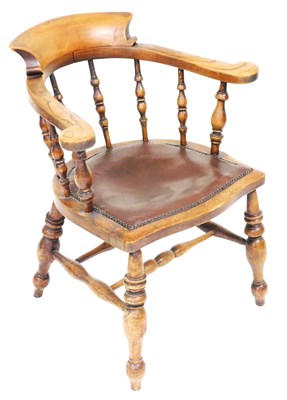 Lot 772 - A Victorian oak smoker's bow chair, with a...