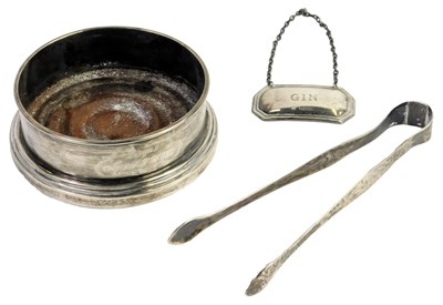 Lot 98 - An Elizabeth II silver wine coaster, with a...
