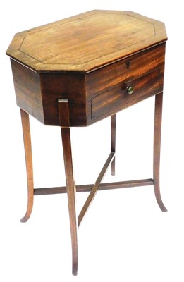 Lot 766 - A George III mahogany sewing table, with line...