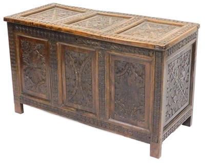 Lot 815 - A 19thC oak blanket chest, with floral carved...