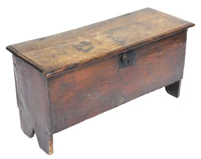 Lot 782 - An 18thC oak blanket chest, raised on plank...