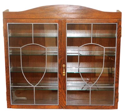 Lot 794 - An oak wall mounted collector's models display...