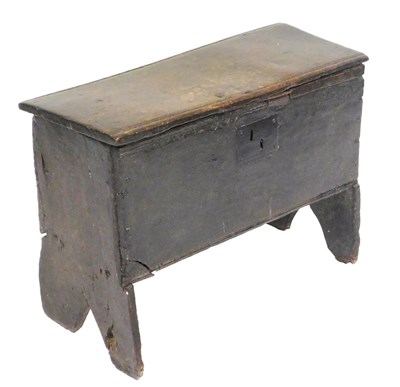 Lot 802 - A 17thC oak coffer, raised on shaped...