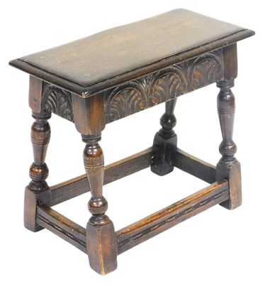 Lot 803 - A 17thC style oak joint stool, with a foliate...