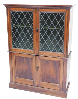 Lot 781 - A Victorian mahogany cupboard bookcase, the...