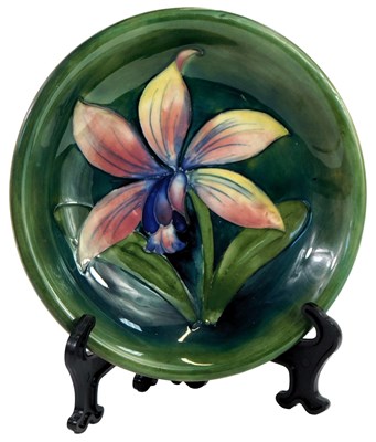 Lot 36 - A Moorcroft pottery dish decorated in the...