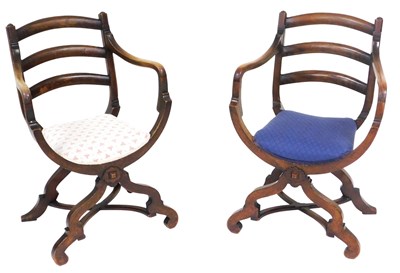 Lot 858 - A pair of Victorian beech X frame ladderback...