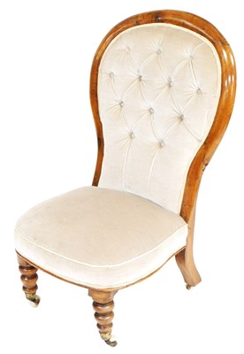 Lot 860 - A Victorian balloon back nursing chair,...