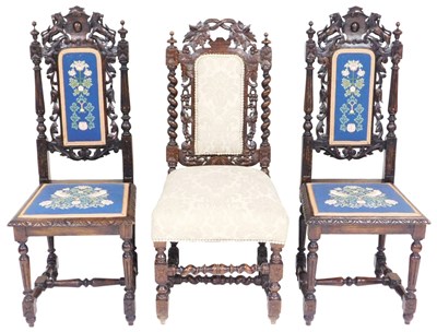 Lot 864 - A pair of Victorian oak hall chairs, with...