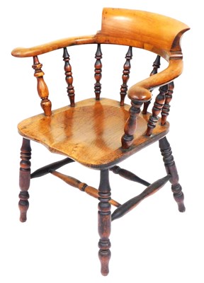 Lot 869 - A Victorian beech and elm captain's chair,...