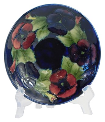 Lot 41 - A Moorcroft pottery dish decorated in the...