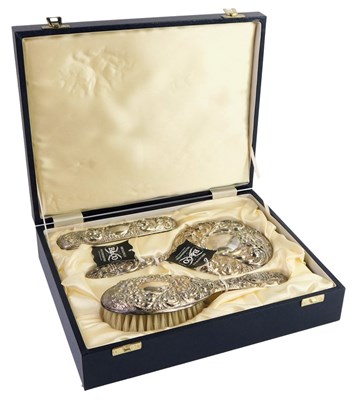 Lot 99 - An Elizabeth II silver mounted three-piece...