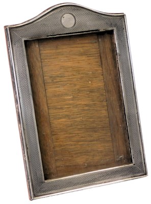 Lot 100 - A George V silver photograph frame, with a...