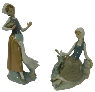 Lot 152 - Two Lladro porcelain figures, one modelled as...