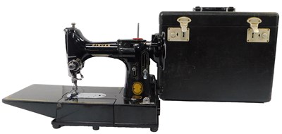 Lot 7 - A Singer 222K sewing machine, with pedal and...