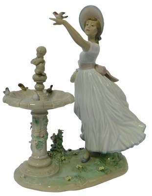 Lot 47 - A Lladro porcelain figure, modelled as a lady...