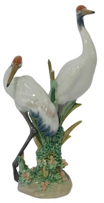 Lot 49 - A Lladro porcelain figure group, modelled as...