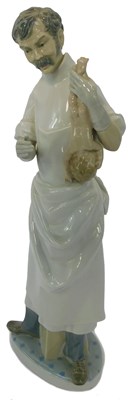 Lot 50 - A Lladro porcelain figure group, modelled as...