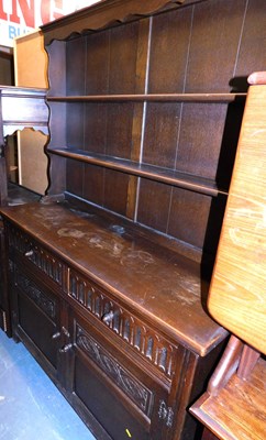 Lot 1115 - An early 20thC oak four drawer chest, together...