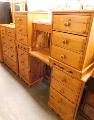 Lot 1117 - A pine bedroom suite comprising a chair of two...