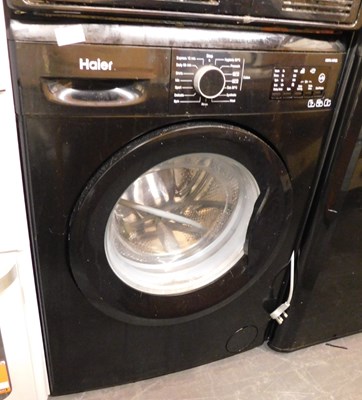 Lot 1129 - A Haier washing machine, HW70-14F2B.