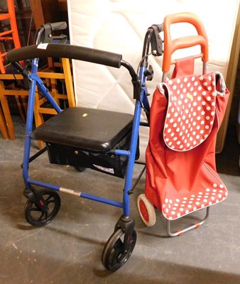 Lot 1134 - A mobility walker, together with a shopping...