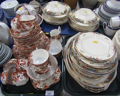Lot 2097 - A part dinner service, unmarked, decorated...