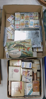 Lot 2103 - A tin containing tea cards, another tin...