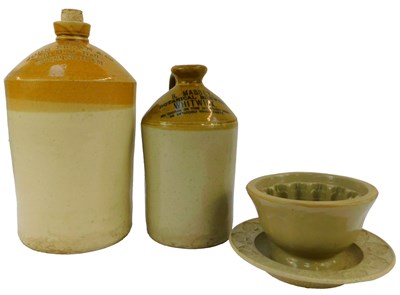 Lot 113 - A group of stoneware, to include a flagon for...