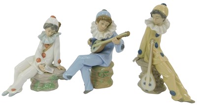 Lot 115 - Three Nao figures, each modelled as a Pierrot,...
