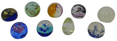 Lot 140 - A group of paperweights, to include a...
