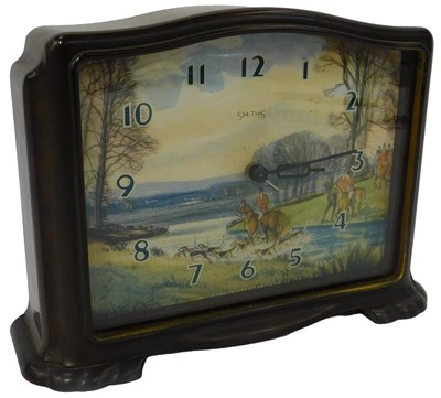 Lot 147 - A Smiths brown Bakelite cased mantel clock,...