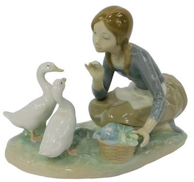 Lot 182 - A Lladro porcelain figure group, modelled as a...