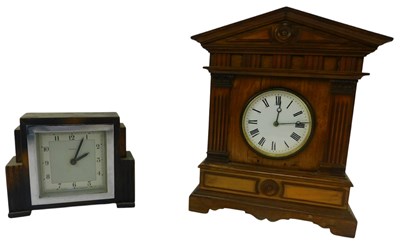 Lot 193 - A late 19thC walnut cased mantel clock, the...