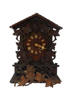 Lot 199 - A late 19thC Black Forest cuckoo clock, the...