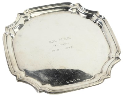 Lot 353 - A George VI silver card tray, the edge of...