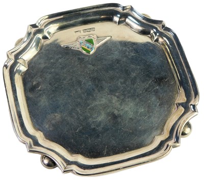 Lot 355 - A George V silver card tray, the edge of...