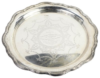 Lot 357 - A George V silver salver, with shaped border...