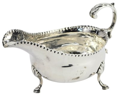 Lot 368 - A George III silver cream jug, with an...