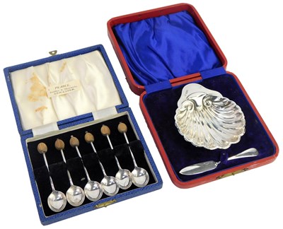 Lot 372 - An Edward VII silver butter dish, of shell...