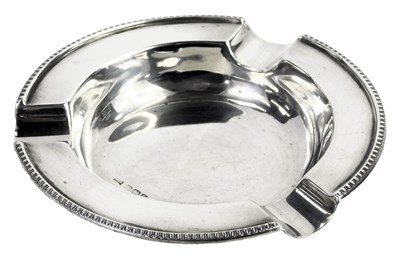 Lot 377 - A George V silver ashtray, of circular form,...