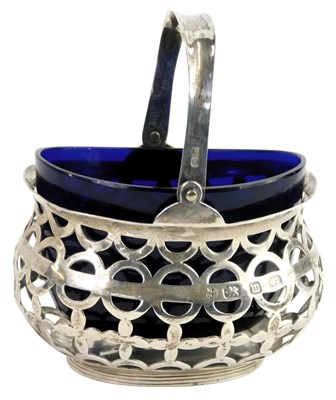 Lot 452 - A Victorian silver sugar basket, of pierced...
