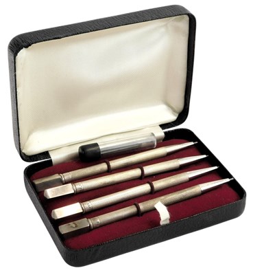 Lot 454 - Four silver bridge pencils, with engine turned...