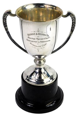 Lot 471 - A George VI silver twin handled...