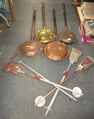 Lot 2133 - Four copper and brass warming pans, and four...