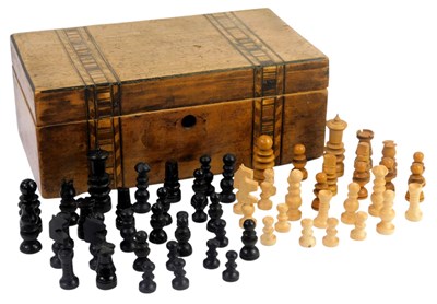 Lot 498 - Assorted wooden chess pieces, in a Victorian...