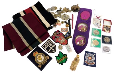 Lot 502 - A group of cap and other military badges, for...