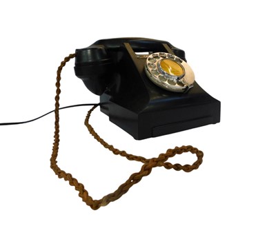 Lot 414 - A 20thC GPO black cased dial telephone, 7207.