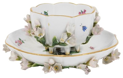 Lot 429 - A Meissen porcelain teacup and saucer, painted...
