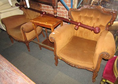 Lot 1031 - Two brown upholstered open armchairs, and a...